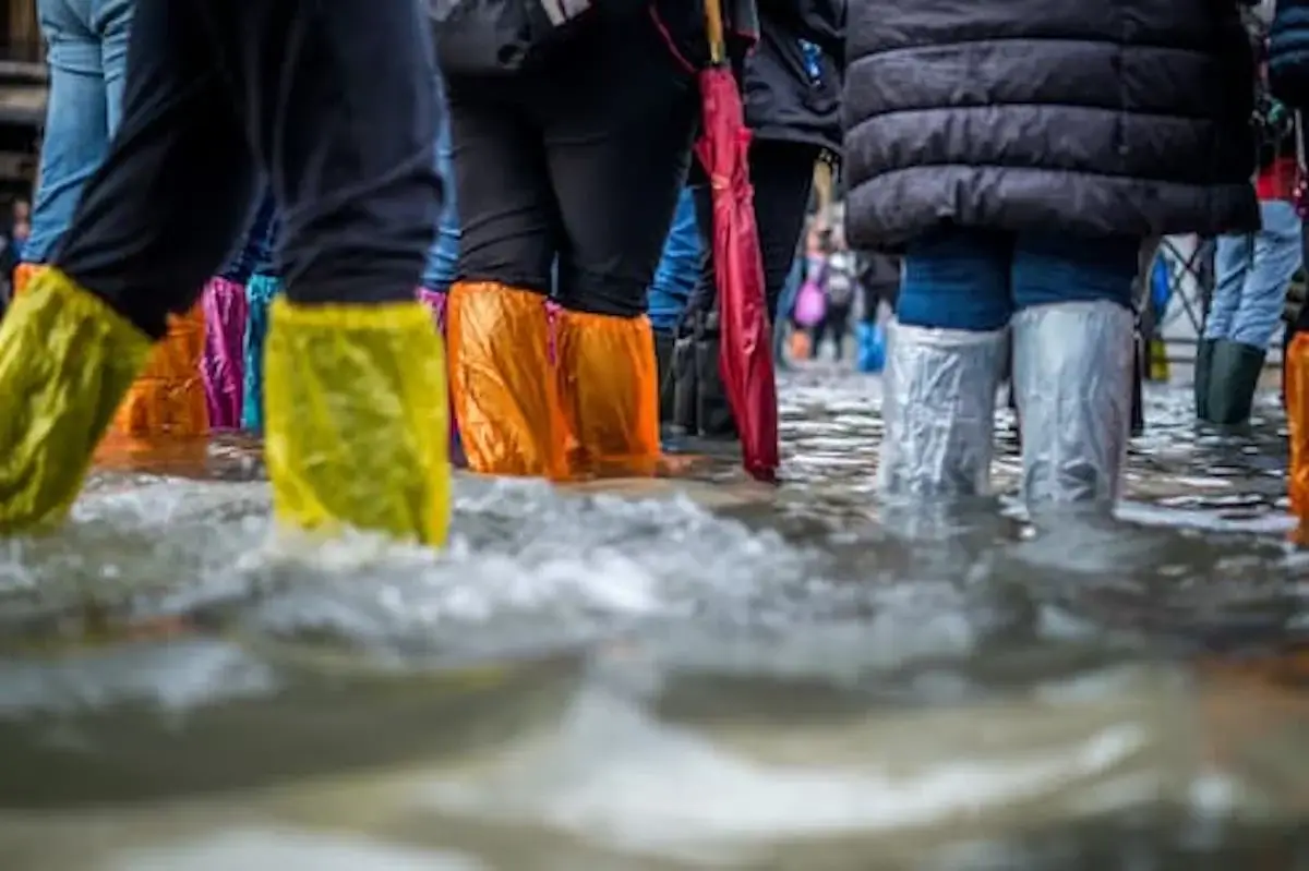 rain boots in flooding water